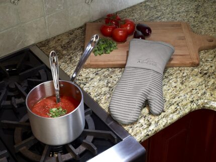 Single All-Clad Premium Silicone Oven Mitt in titanium gray, showing textured silicone grip and flexible design.