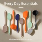 A complete 5-piece AUWUB navy blue silicone kitchen utensil set, including spatulas and spoons, displayed neatly.
