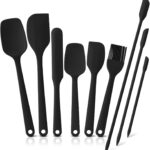 A complete 9-piece set of black silicone spatulas, including various shapes for cooking and baking tasks.