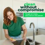 A stack of natural, light brown bioGo cellulose kitchen sponges, showcasing their texture and eco-friendly design.