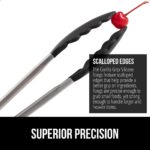 Two cooking tongs, one 7-inch and one 9-inch, with brushed stainless steel handles and black silicone tips, in a kitchen sett