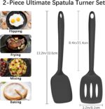 Two PureBlack silicone spatulas, one solid and one slotted, lying on a clean kitchen surface, ready for cooking.