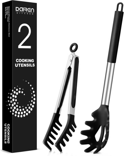 Close-up of a black silicone pasta tong and a polished stainless steel spaghetti spoon with teeth
