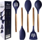 Five midnight blue silicone kitchen utensils with natural acacia wood handles, including a spoon, spoonula, spatula, turner,