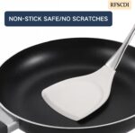 A set of white silicone cooking utensils with stainless steel handles, including a spatula, ladle, spoon, whisk, and tongs.