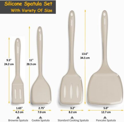A set of four khaki silicone spatulas of varying sizes, including a slotted and a pancake spatula, on a neutral background.
