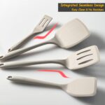 A set of four khaki silicone spatulas of varying sizes, including a slotted and a pancake spatula, on a neutral background.